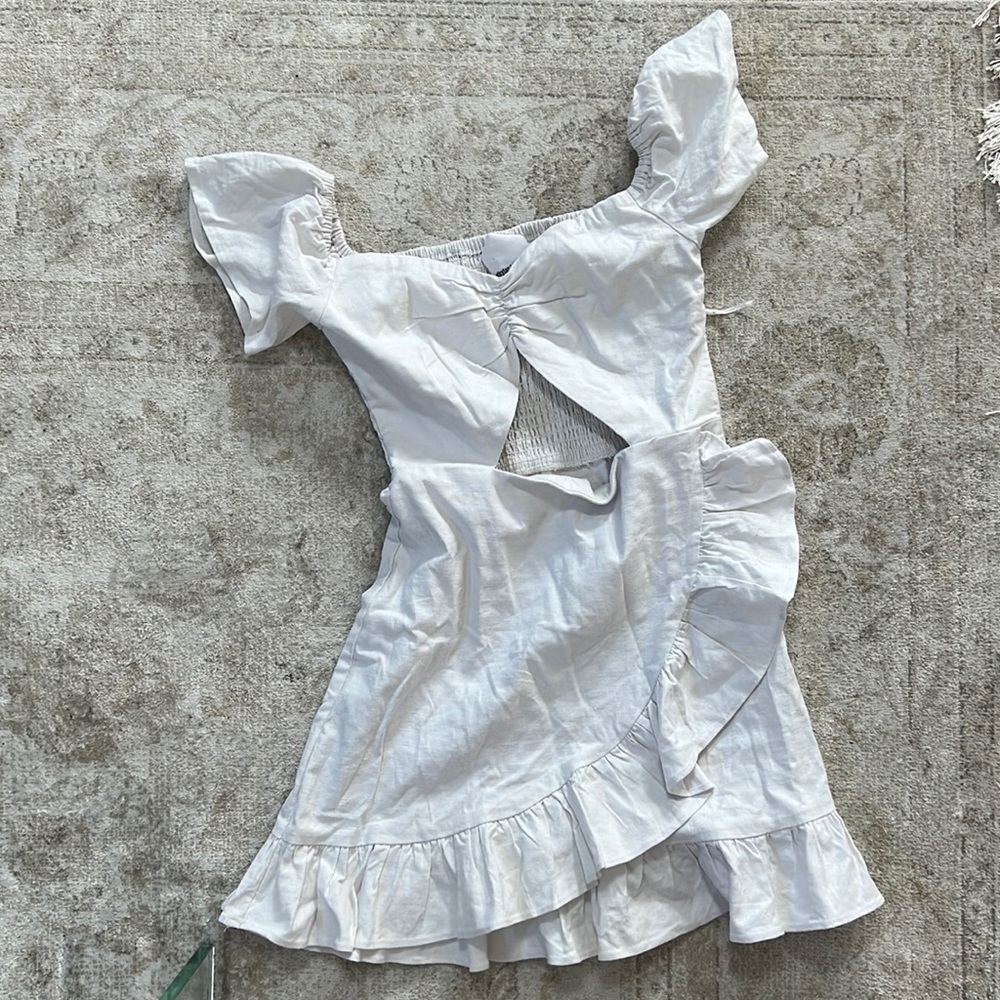 White Babydoll Dress with Cutout, Ruffles, and Puff Sleeve
